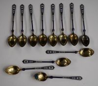 Set of 12 hallmarked silver and blue and white enamel spoons, seven of the spoons having import