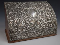 Silver mounted stationery box with embossed floral and foliate decoration, marked Sterling to
