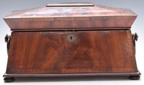 Late Regency William IV flame mahogany and rosewood sarcophagus tea caddy with ring handles and