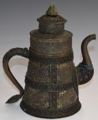 An oriental relief moulded metal sectional teapot, possibly Chinese / Tibetan