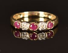 A 9ct gold ring set with rubies and diamonds, size N, 1.6g