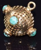 A yellow metal pierced charm set with glass cabochons, 4.1g