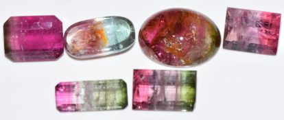 Four loose watermelon tourmaline and two bi-coloured tourmaline