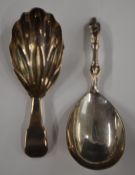 Two hallmarked silver caddy spoons, one Georgian fiddle pattern with shell shaped bowl, London 1808,