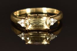 A 9k gold ring set with a zultanite and diamonds, size M, 2.1g