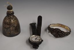 George V hallmarked silver novelty bell formed as a lady in voluminous dress, her legs forming the