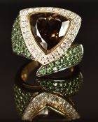 A 9k gold ring set with smoky quartz, tsavorite garnets and diamonds, size M, 11g