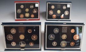 Royal Mint UK Proof coin sets 1983, 1984, 1985 and 1986, in deluxe cases