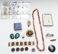 A collection of costume jewellery including carnelian necklace, silver bracelet, Siam silver brooch,