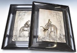 Pair of framed WMF silver plated panels with relief decoration, one depicting a man on camel below