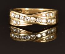A 9ct gold ring set with cubic zirconia, size M, 2.9g