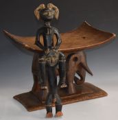 African carved figural elephant tribal stool and a figure, largest H36, W 50cm