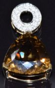 A 9k gold pendant set with a trilliant cut quartz and diamonds, 5.2g