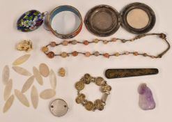 Twelve Chinese mother of pearl counters, amethyst carved pendant, Japanese compact, cinnabar lacquer