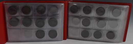 Two coin collector's albums containing a collection of farthings from George II through to 1956