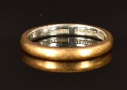 A 22ct gold and platinum ring, size L, 4g