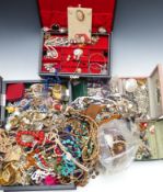 A collection of jewellery including cameos, vintage brooches, beads, vintage earrings, white metal