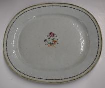 Chinese 19thC famille rose oval plate with central floral decoration, 33x38cm