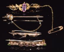 A 9ct gold brooch in the form of a shell set with a seed pearl, two 9ct gold brooches (5.8g) and