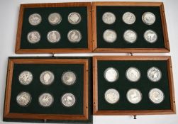 Twenty four proof silver crown size coins, various countries, to include Mauritius, Central America,