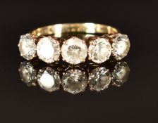 A 9ct gold ring set with five cubic zirconia, 3.2g, size P/Q