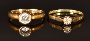 A 9ct gold ring set with cubic zirconia (size L, 1.7g) and a 9ct gold ring set with a diamond,