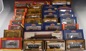 Thirty-one Bachmann, Hornby and Mainline 00 gauge wagons, all in original boxes.