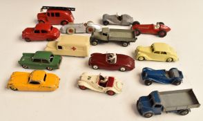 Fourteen Dinky Toys diecast model vehicles including MG Midget, Triumph Herald and Daimler