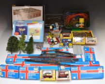 A collection of N gauge model railway buildings, vehicles, track and accessories including Graham