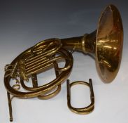 A travelling French horn, the main brass body and slides disconnecting from the bell to fit into a