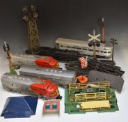 A collection of Lionel 0 gauge model railway items including steam locomotive, Santa Fe diesel