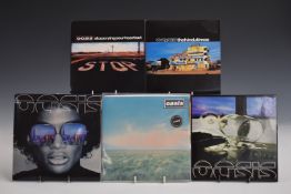 Oasis - Eight singles including Whatever, Who Feels Love, Sunday Morning Caller, The Hindu Times,