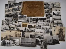 Collection of photographs and postcards relating to India circa 1940's including gypsies, train