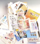 Gibraltar and Canada stamps and covers, singles and blocks and a Canada specialist catalogue,