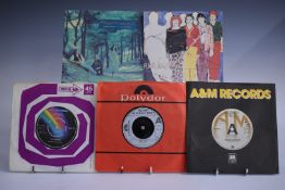 Approximately 200 singles including Robert Palmer, Pet Shop Boys, Tom Petty, Pilot, Robert Plant, PM
