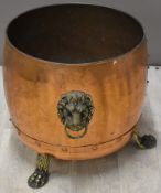 Copper log bin with brass lion paw feet, H41cm
