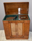 Ultra radiogram c1940s, with ivory coloured station dial, Bakelite knobs and cloth speaker covers,