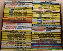 Fifty-seven children's humour annuals including Whoopee, Whizzer & Chips, Cheeky etc.