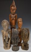Five various African tribal figures, height of tallest 72cm