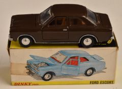 Dinky Toys diecast model 168 Ford Escort with brown body, plated bumpers and trim, 168, in