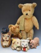 Six vintage Teddy bears including a blonde mohair example with clockwork musical box playing