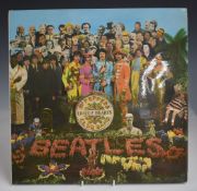 The Beatles - Sgt Pepper's Lonely Hearts Club Band (PCS 7027) (YEX 637-1) record and cover appear