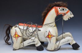 Vintage hand carved wooden Muffin The Mule style puppet, possibly a shop display or advertising