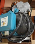 Three various small motors and pulleys