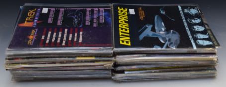 Over ninety Star-Trek Magazines, comics and poster books including Marvel's Star-Trek Next