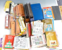 Three GB first day cover albums, unopened philatelic accessories, including Arch cover pockets,