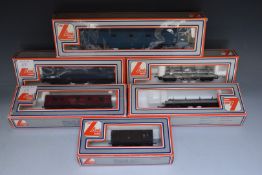 Six Lima 00 gauge model railway locomotives, wagons and vans, all in original boxes.