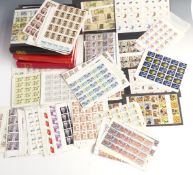 Three albums of mint QEII stamps, mainly 1970s-1990s, comprising quarter sheets and larger blocks,