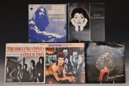 Approximately 110 singles mostly Beatles, Rolling Stones, Kate Bush, Queen, T Rex and David Bowie
