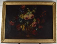 Oil on canvas still life vase of flowers, signed lower right possibly Lopez-Huici, 55 x 77cm, in